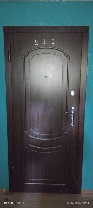 Двері вхідні металеві +вікна м.п