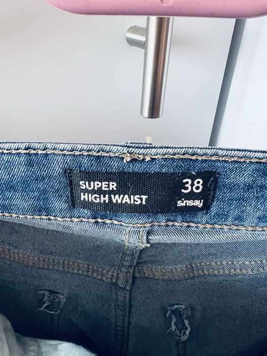 Jeansy damskie typu super high waist