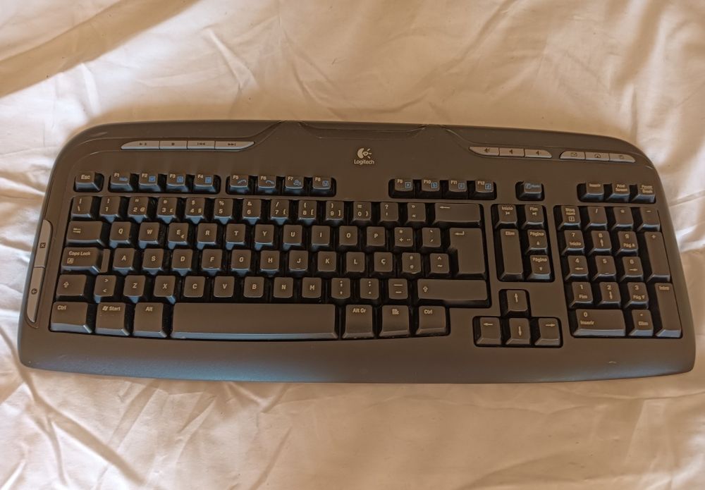 Teclado sem fios Logitech Cordless Desktop EX 110