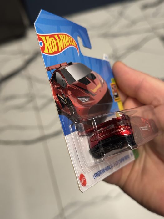 Hot Wheels Lamborghini Huracan LP 620-2 Super Trofeo HW Exotics 8/10 (239/250) HTC25 Rosso 2024 + protezione corta Card Frikimonkey