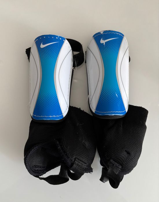 Caneleiras Nike Youth Mercurial Shield