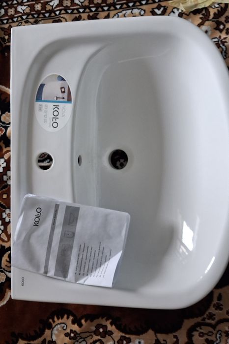 Керамічний умивальник серії KOLO