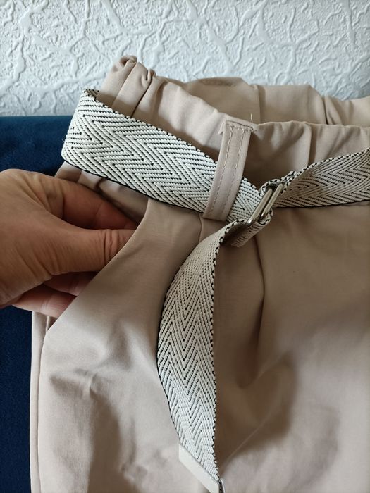 Nowe beżowe rybaczki
