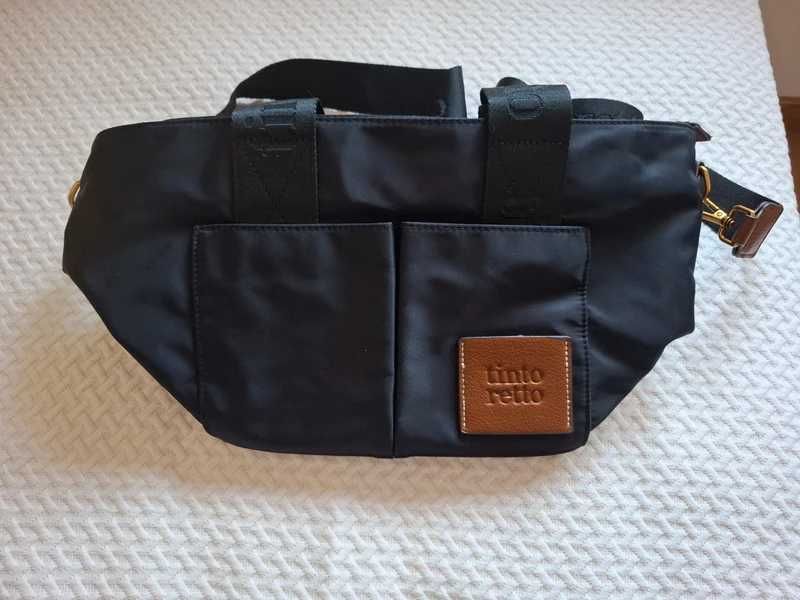 Mala preta e castanha da Tintoretto