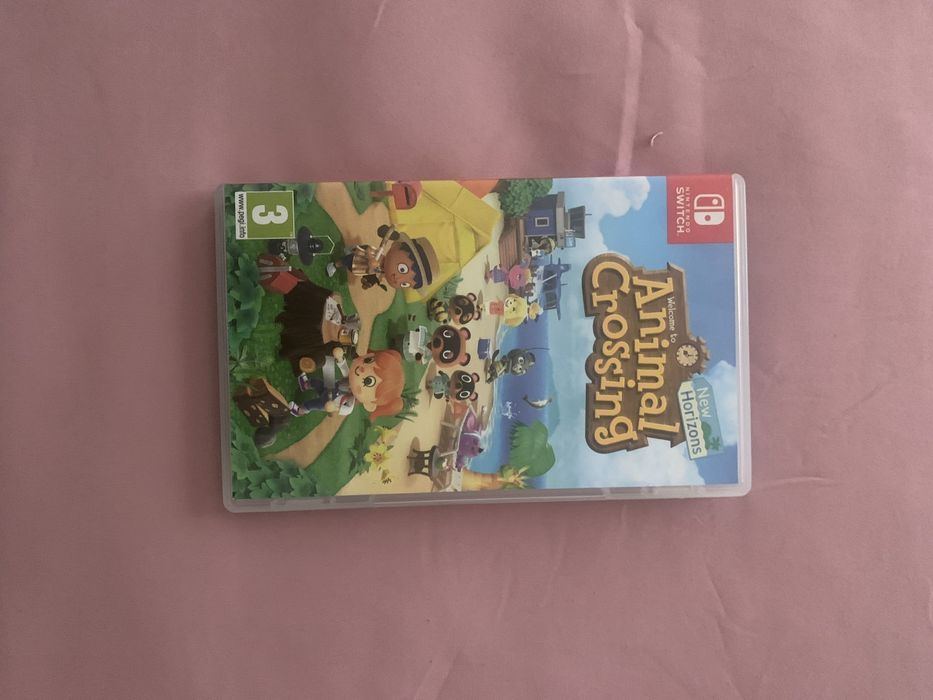 Nintendo Switch Vermelho/Azul Joy-Con c/Jogo Animal Crossing