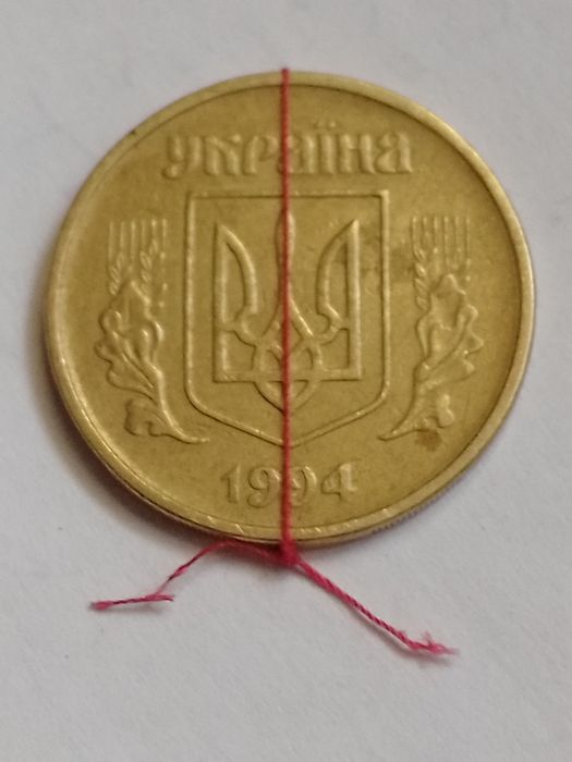 Брак монет України