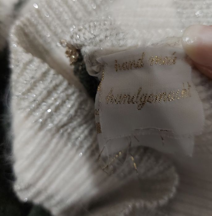 Wełniany sweter handmade z wizerunkiem kobiety/anioła