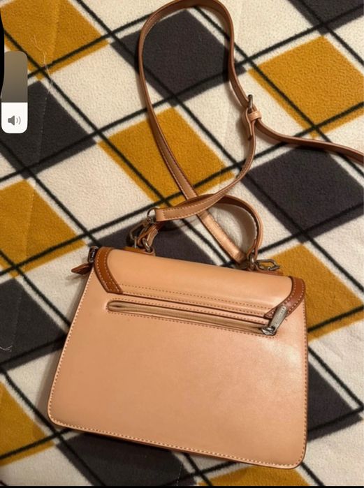 Mala a tiracolo castanha