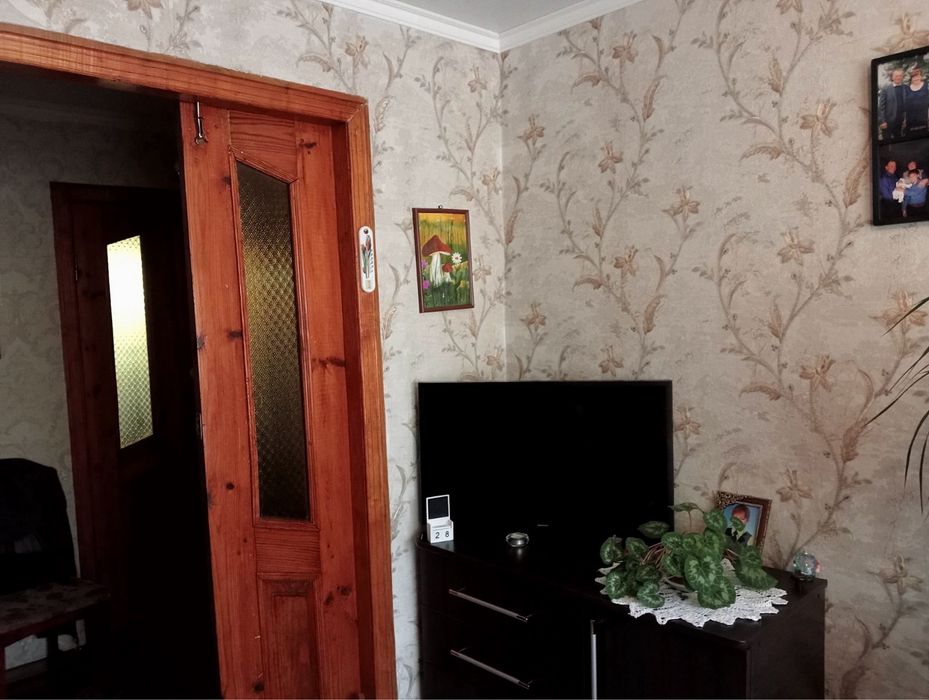 Продам квартиру двоповерхову,гараж,погріб,город