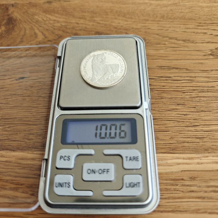 Srebro. 10 dollars 1990  Tygrys. Certyfikat