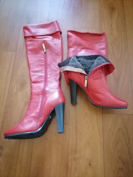 Шкіряні ботфорти .