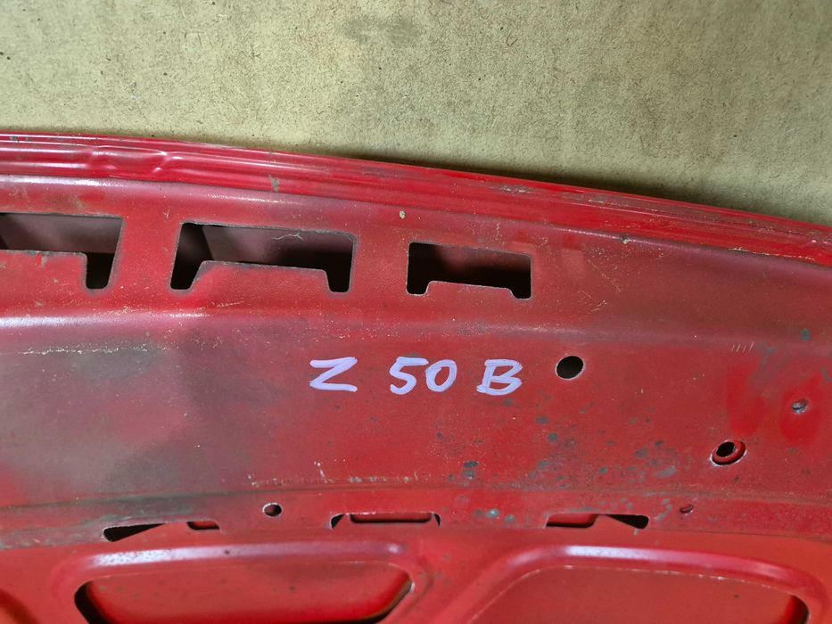 Opel Astra IVJ maska pokrywa silnika.