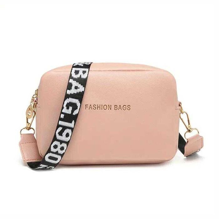 Компакта та зручна жіноча сумка з широким ремішком. Білий, чорний т