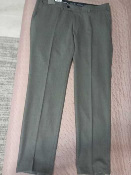 Markowe spodnie garniturowe Eurex  nowe