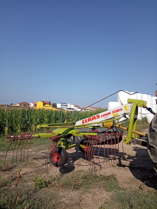 Juntador de feno Claas