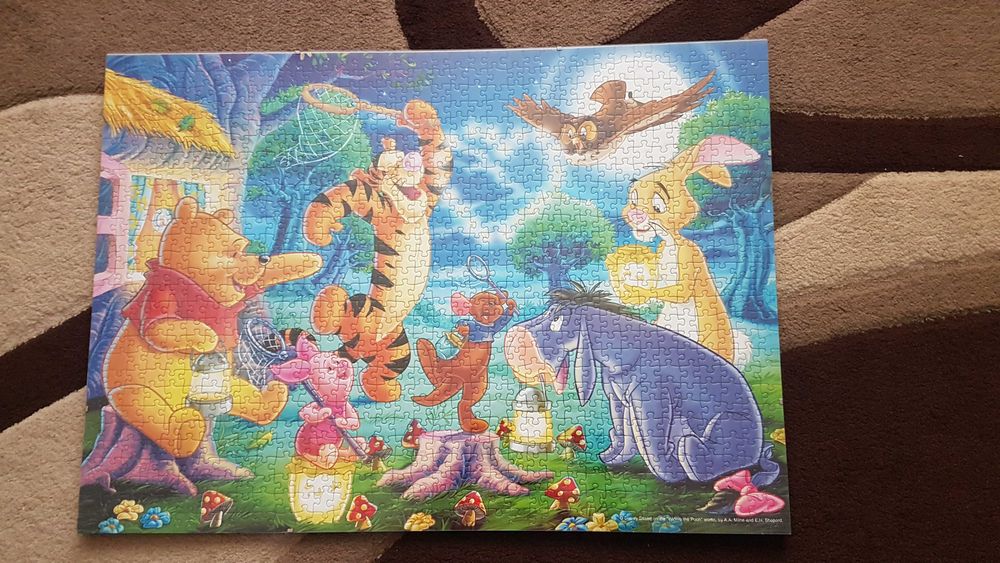 Puzzle w antyramie 1000 el. Ravensburger Kubuś Puchatek łapie świetlik