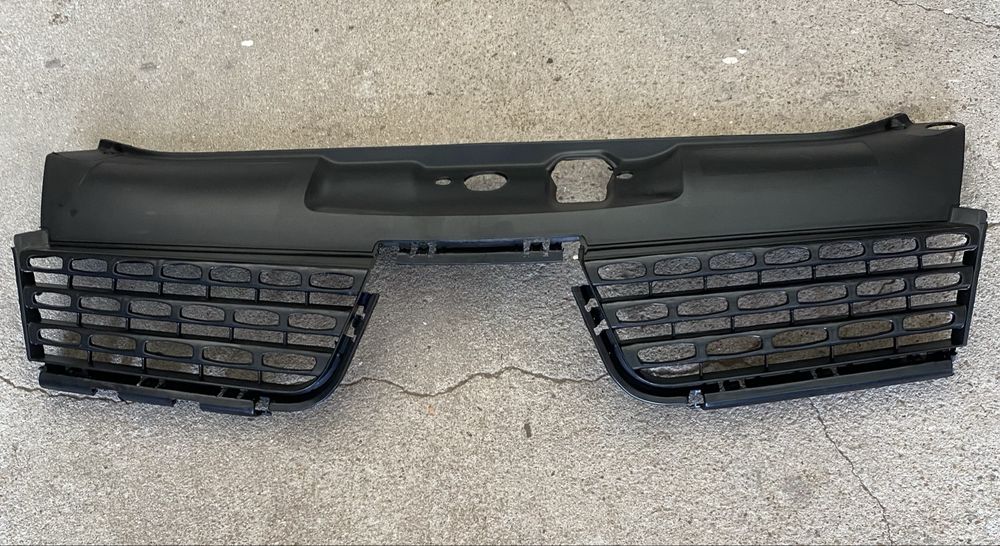 Grelha frontal renault clio
