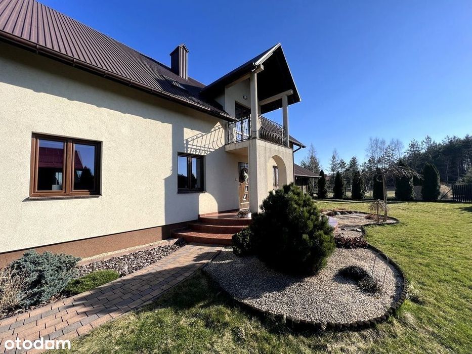Dom z dużym ogrodem i fotowoltaiką