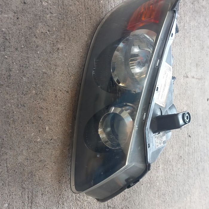 Farol passageiro nissan almera n16