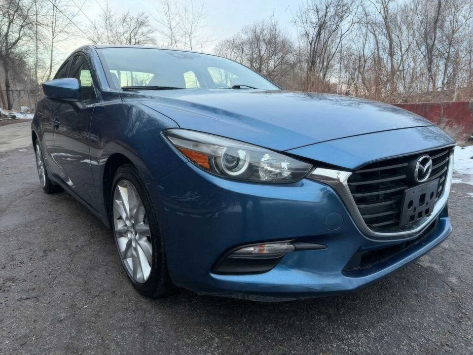 Mazda 3 i Grand Touring      2016