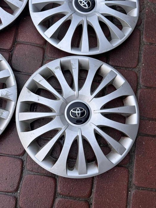 '15 Kołpaki komplet oryginalne Toyota Yaris Auris Aygo Avensis Proace