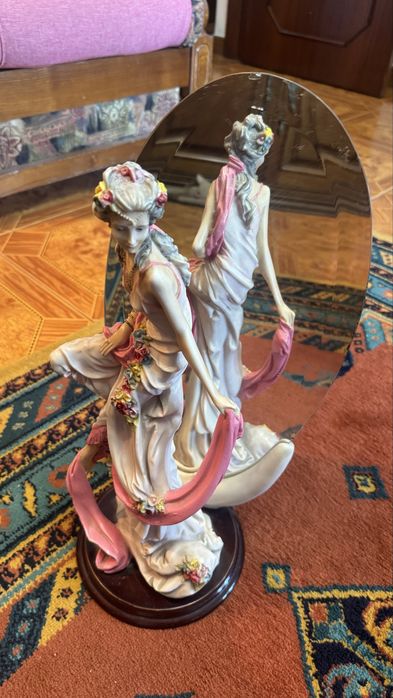 Estatua com espelho