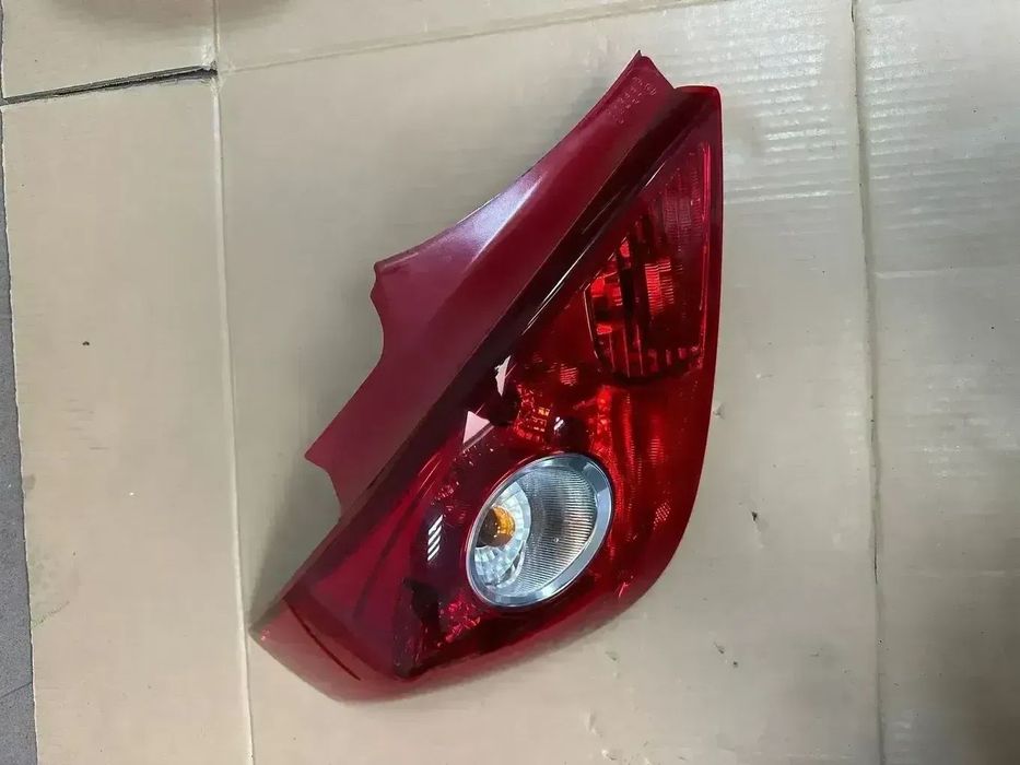 OPEL CORSA D LAMPA LEWA TYLNA 3 DRZWI EUROPA 13186350