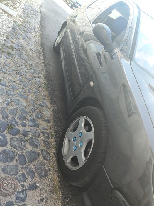 Peugeot 206 teto panorâmico 1.4 gasolina
