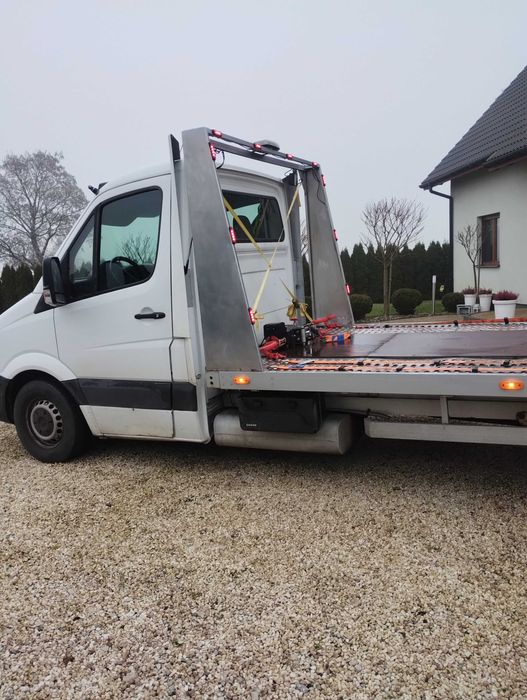 Pomoc drogowa holowanie transport auto laweta