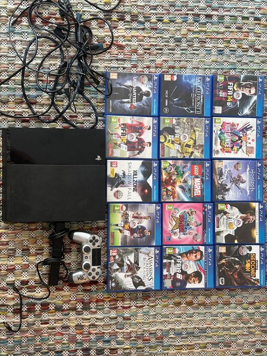 PS4 z padem, kamerą i grami