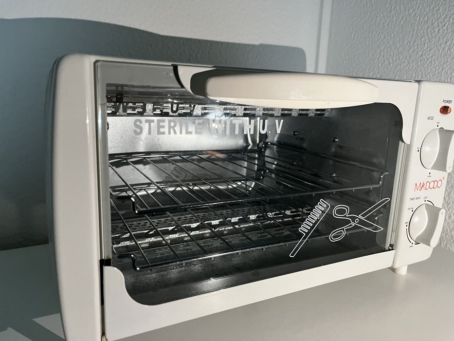 Esterilizador em bom estado com luz violeta