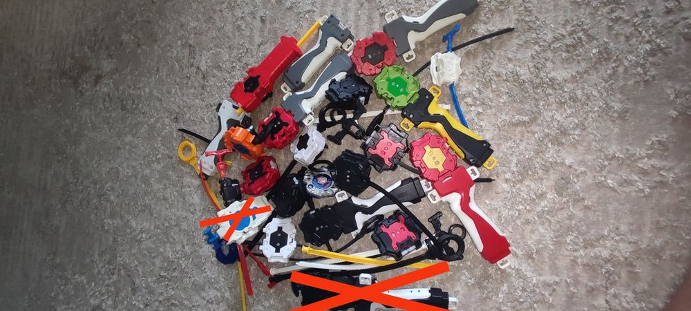 Продам  бейблейди та  пускателі