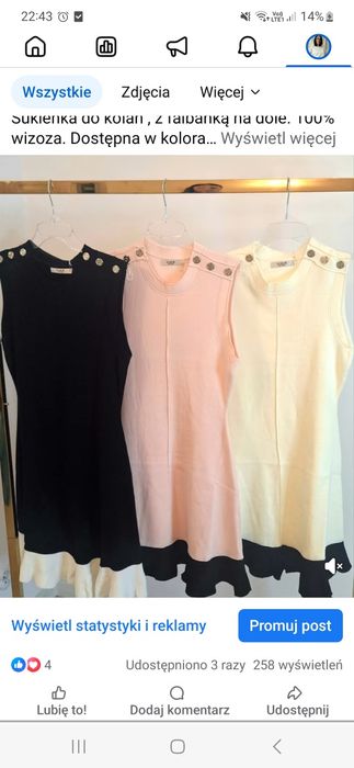 Sukienka jasnożółta do kolan.