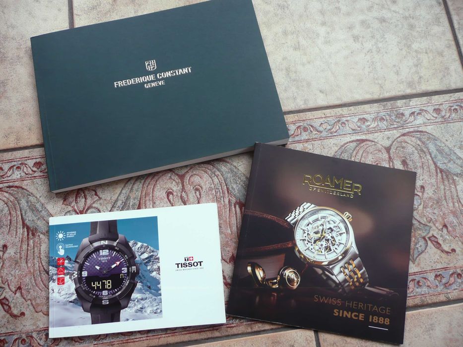 foldery katalogi zegarków roamer tissot constant