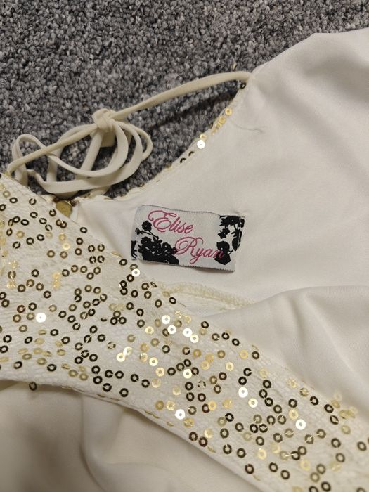 Sukienka ecru z cekinami