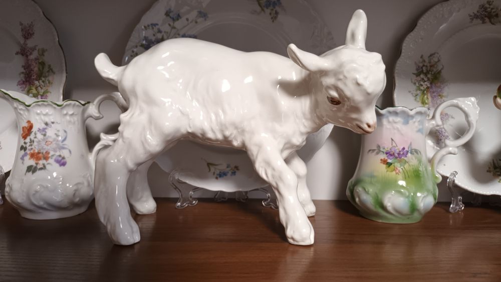 Подсвечник путти.  Козленок. Штоф козак.