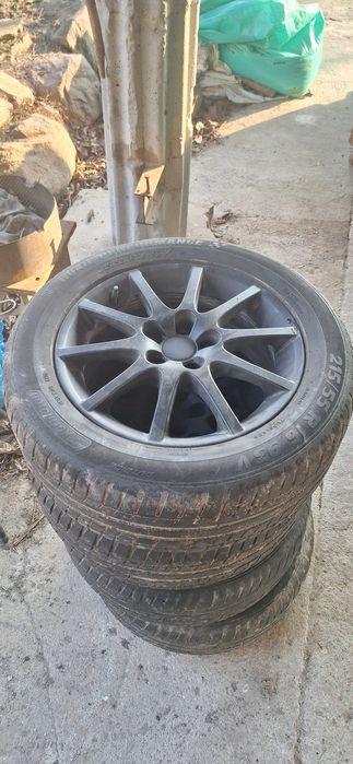 Sprzedam aluminiowe felgi do Saab R16 z oponami 215/55 R16.
