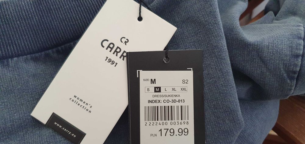Modna sukienka dresowa Carry melanż w rozmiarze M. Nowa, z metką.