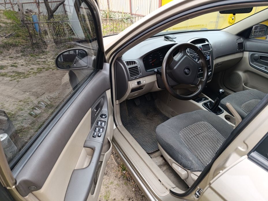 KIA Cerato 2.0 газ-бензин на кліматі