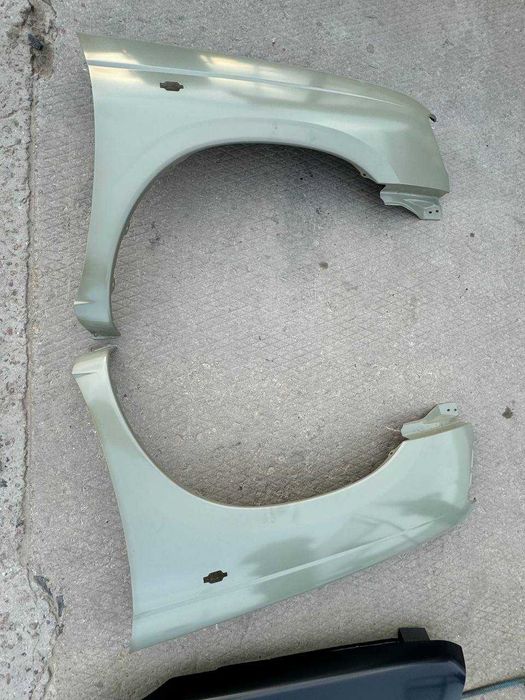 Передні Крила до Nissan Navara 1998-2002 (ціна за шт.)