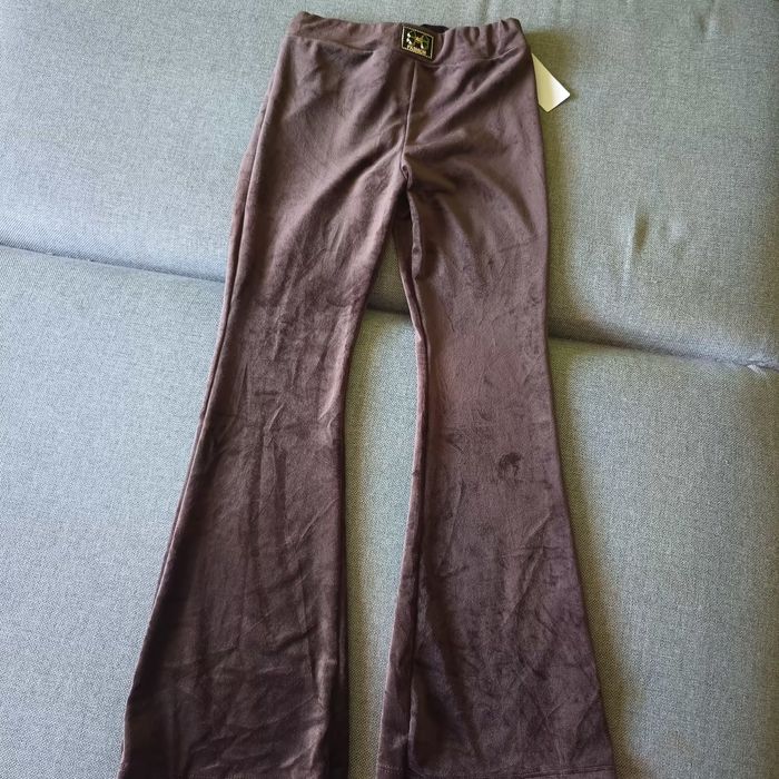 Nowe spodnie welur dzwony