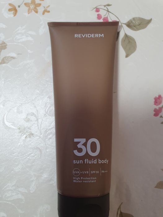 Сонцезахисний крем спрей