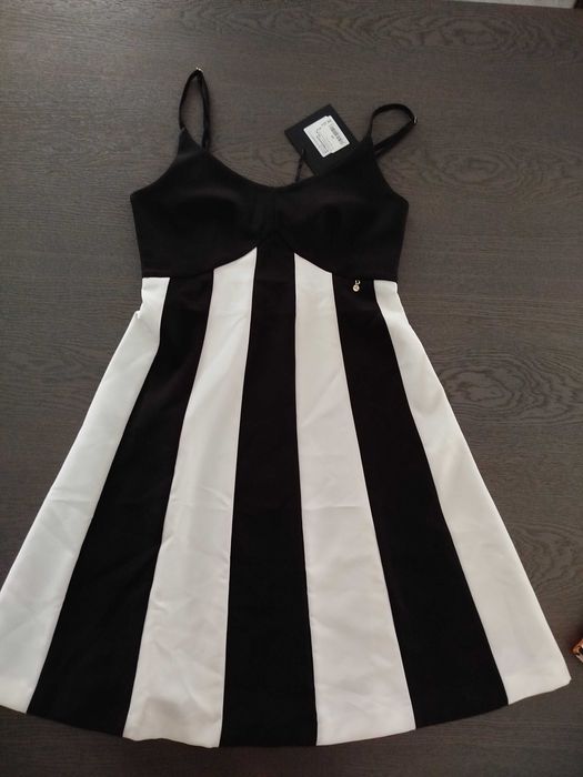 10 vestidos novos de marca 22.50€...