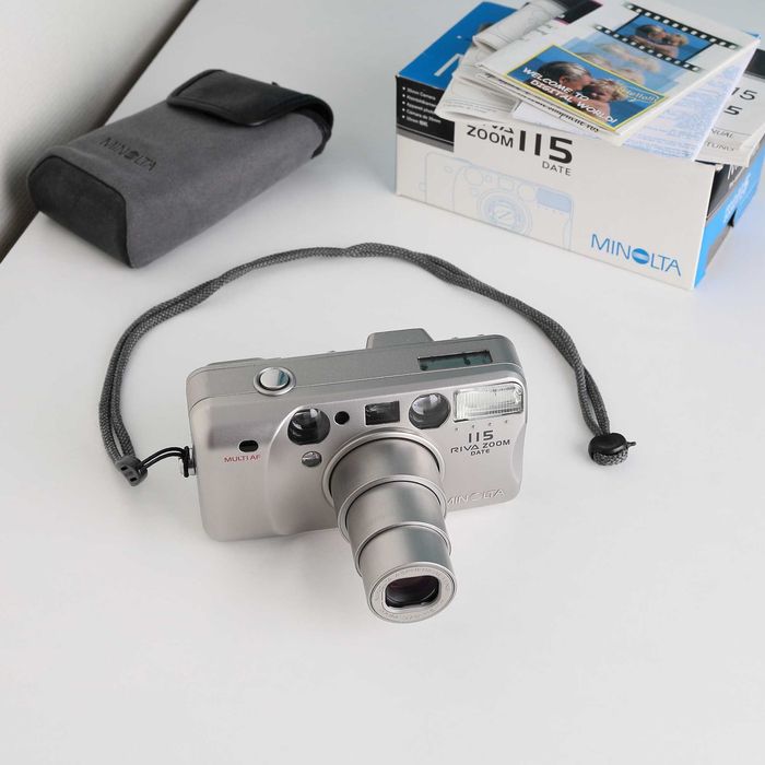 Minolta RIVA ZOOM DATE 115 - Плівковий фотоапарат