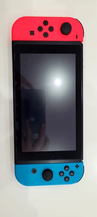 Nintendo Switch + Cartão microSD 128 GB + 2 Jogos
