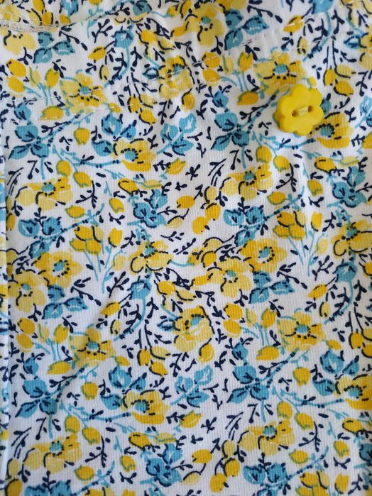 Legginsy/białe/kwiatki/ źółte/niebieskie/Coccodrillo/r.80