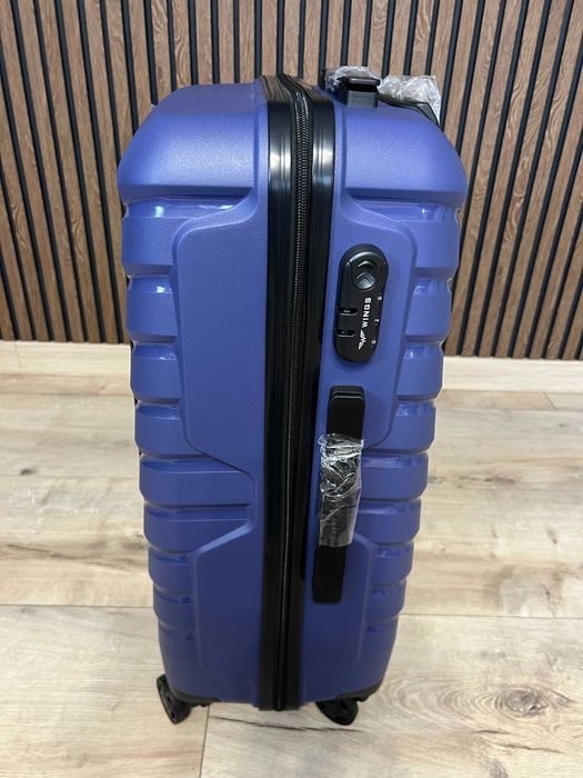 Валіза дорожня з поліпропілену подвійні колеса НЕ ТРІСКАЄ Чемодан PHX