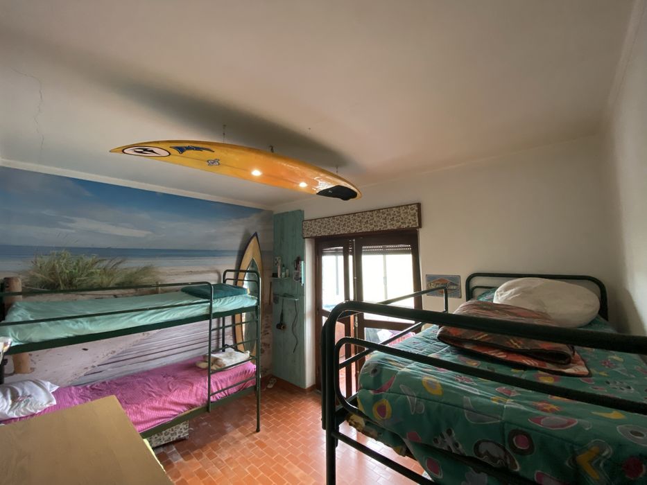 Quarto completo, motivo de surf