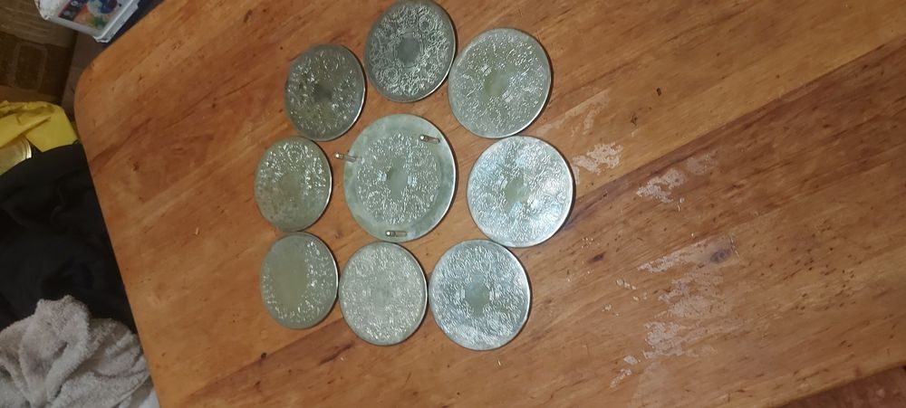 Srebrne podstawki pod szklanki plus platerowana łyżka