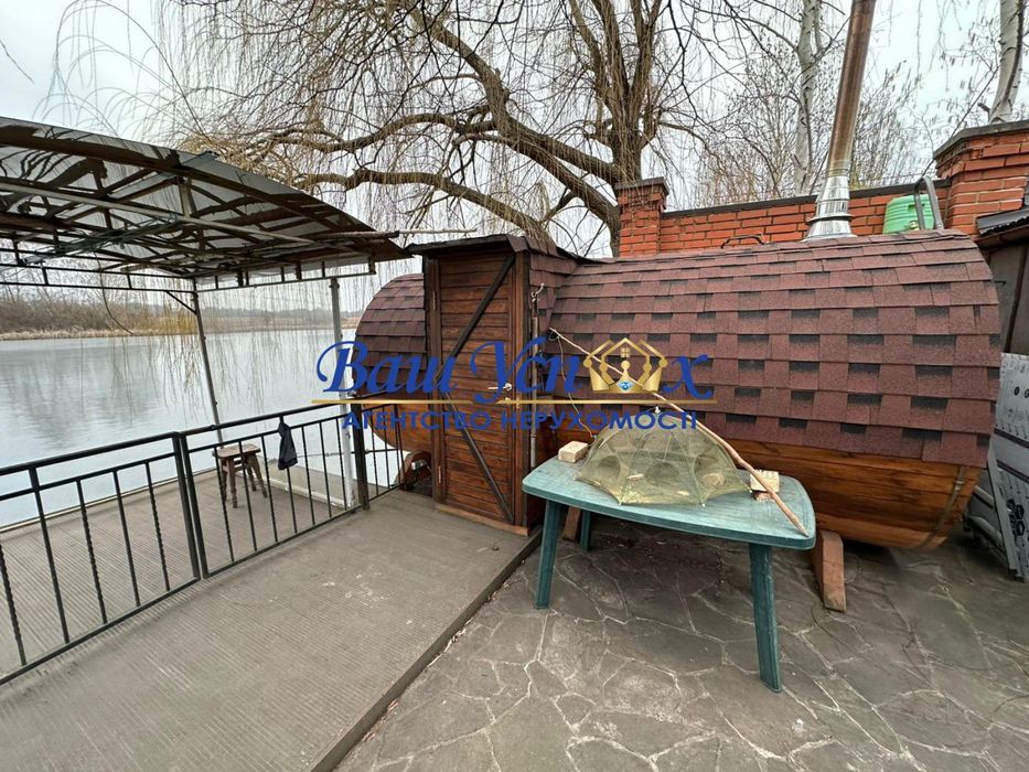 Продаж дома с выходом на реку Конча-Заспа ,дамба . село Козин